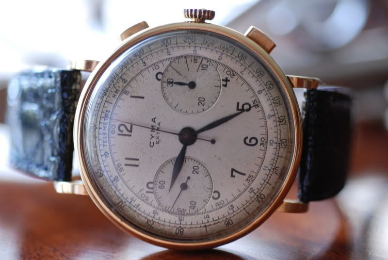 http://i82.photobucket.com/albums/j279/kurt48/Vintage/Cyma%20Chronograph/DSC_0173.jpg